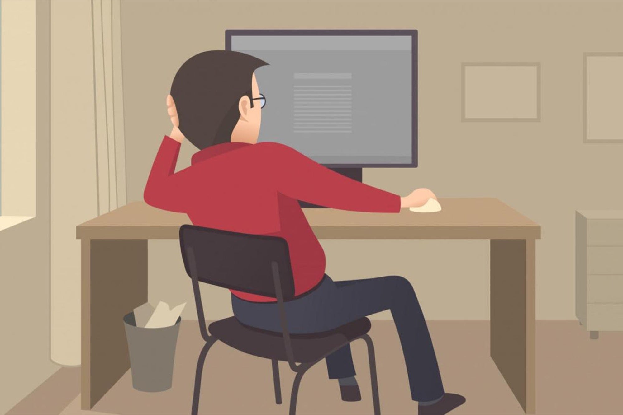 Человек сидит за компьютером